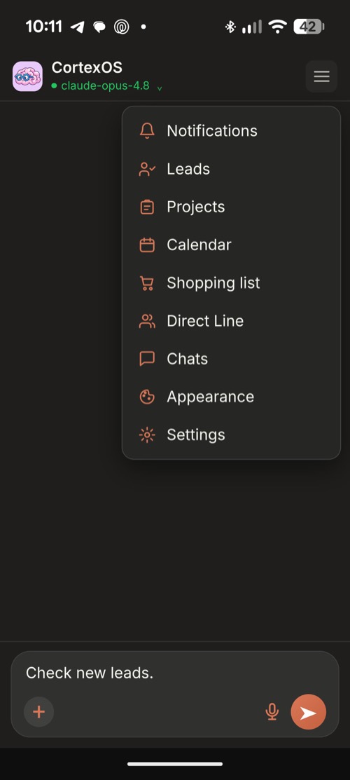 CortexOS installed as a PWA on a phone in dark theme, showing the navigation menu: Notifications, Leads, Projects, Calendar, Shopping list, Direct Line, Chats, Appearance and Settings.